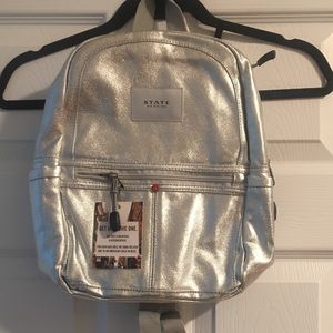 Metallic silver STATE backpack